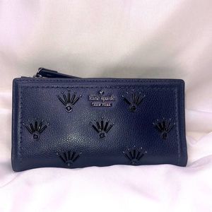 kate spade blue wallet with black 3D eyelash design